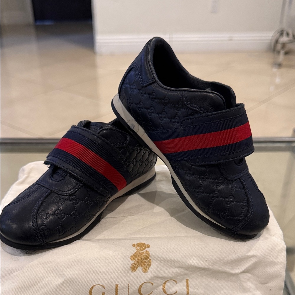 Gucci Kids Navy Leather Sneakers with Red/Blue Web Stripe $100